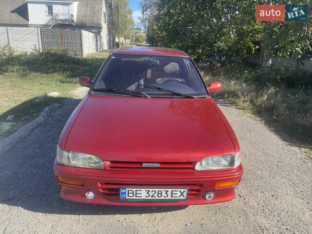Червоний Тойота Королла, об'ємом двигуна 1.3 л та пробігом 187 тис. км за 2350 $, фото 1 на Automoto.ua