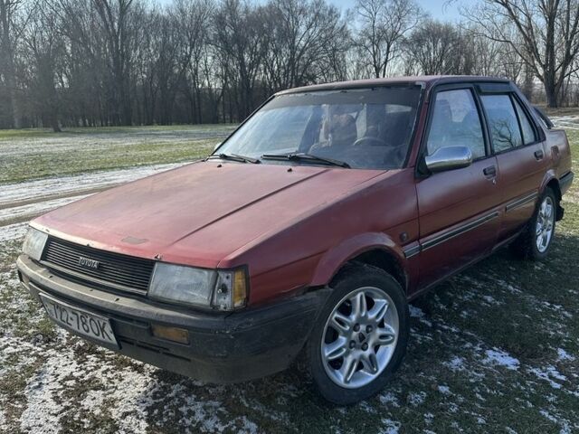 Червоний Тойота Королла, об'ємом двигуна 1.3 л та пробігом 346 тис. км за 882 $, фото 1 на Automoto.ua