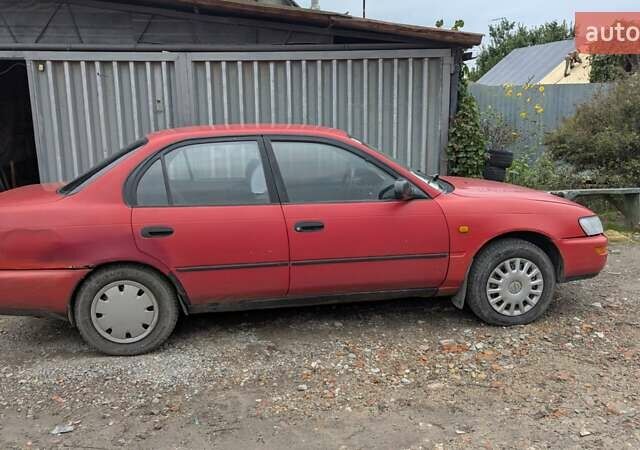 Красный Тойота Королла, объемом двигателя 1.3 л и пробегом 400 тыс. км за 2000 $, фото 1 на Automoto.ua