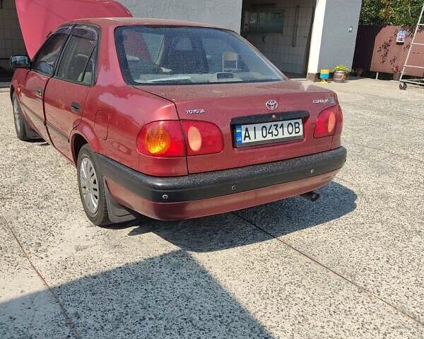 Красный Тойота Королла, объемом двигателя 1.4 л и пробегом 350 тыс. км за 4000 $, фото 1 на Automoto.ua