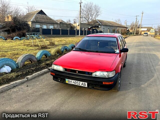 Красный Тойота Королла, объемом двигателя 1.2 л и пробегом 212 тыс. км за 1100 $, фото 1 на Automoto.ua