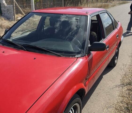 Красный Тойота Королла, объемом двигателя 1.3 л и пробегом 3 тыс. км за 1300 $, фото 1 на Automoto.ua