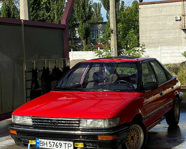 Красный Тойота Королла, объемом двигателя 1.3 л и пробегом 229 тыс. км за 2350 $, фото 1 на Automoto.ua