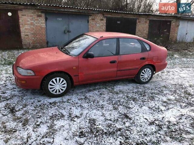 Красный Тойота Королла, объемом двигателя 1.3 л и пробегом 449 тыс. км за 1300 $, фото 1 на Automoto.ua