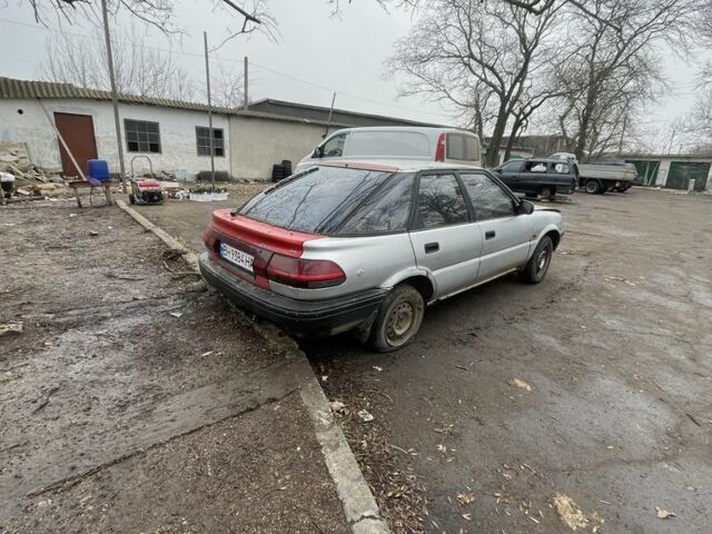 Серый Тойота Королла, объемом двигателя 1.3 л и пробегом 100 тыс. км за 350 $, фото 1 на Automoto.ua