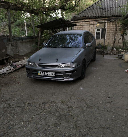 Серый Тойота Королла, объемом двигателя 1.3 л и пробегом 450 тыс. км за 1200 $, фото 1 на Automoto.ua