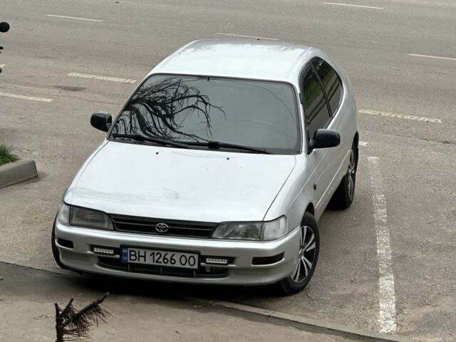 Серый Тойота Королла, объемом двигателя 1.3 л и пробегом 300 тыс. км за 3200 $, фото 1 на Automoto.ua