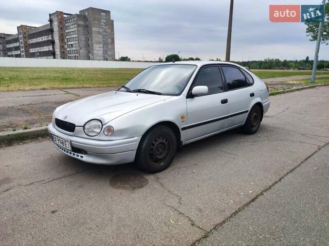 Серый Тойота Королла, объемом двигателя 1.6 л и пробегом 313 тыс. км за 1750 $, фото 1 на Automoto.ua