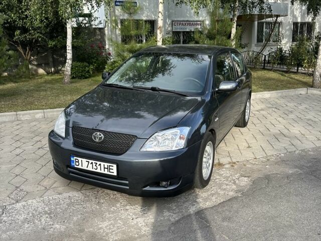 Серый Тойота Королла, объемом двигателя 2 л и пробегом 299 тыс. км за 4500 $, фото 1 на Automoto.ua