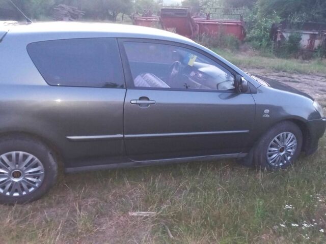 Сірий Тойота Королла, об'ємом двигуна 2 л та пробігом 330 тис. км за 4199 $, фото 1 на Automoto.ua