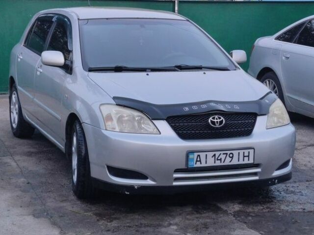 Серый Тойота Королла, объемом двигателя 1 л и пробегом 305 тыс. км за 3500 $, фото 1 на Automoto.ua