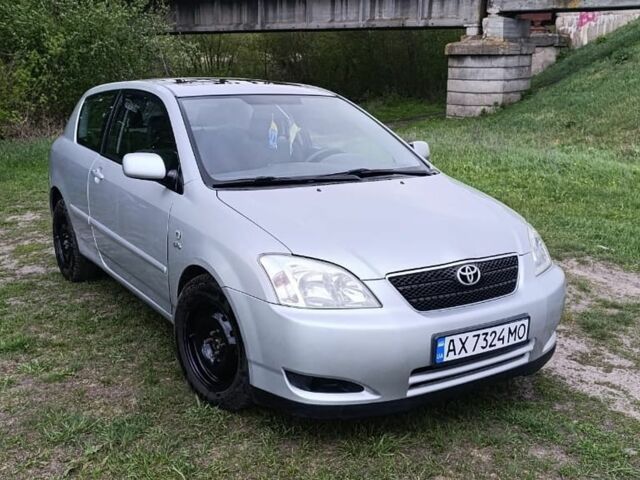 Сірий Тойота Королла, об'ємом двигуна 2 л та пробігом 324 тис. км за 5200 $, фото 1 на Automoto.ua
