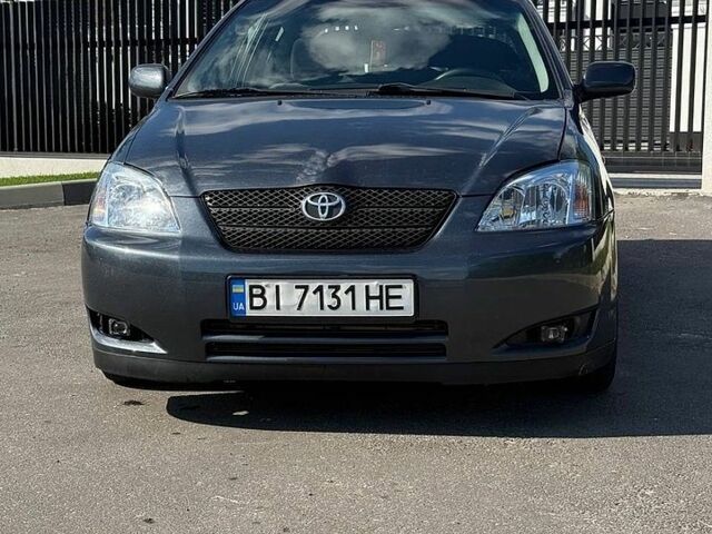 Серый Тойота Королла, объемом двигателя 2 л и пробегом 316 тыс. км за 4000 $, фото 1 на Automoto.ua