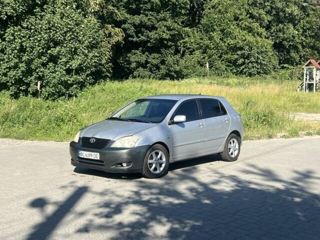 Сірий Тойота Королла, об'ємом двигуна 2 л та пробігом 320 тис. км за 3100 $, фото 1 на Automoto.ua