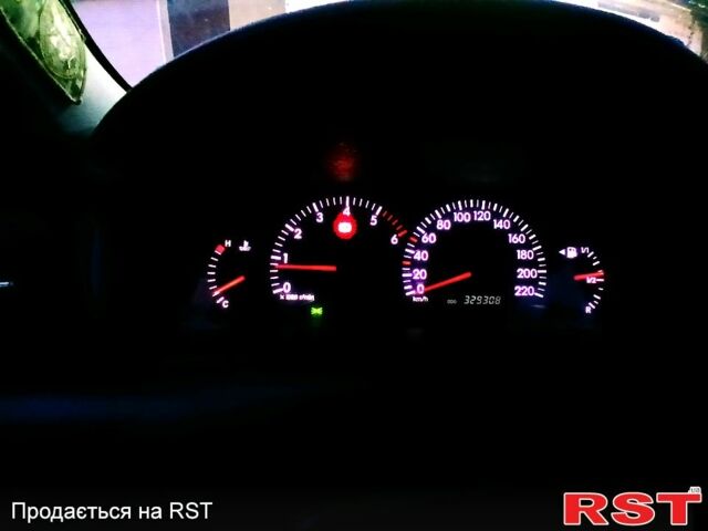 Серый Тойота Королла, объемом двигателя 2 л и пробегом 320 тыс. км за 3700 $, фото 1 на Automoto.ua