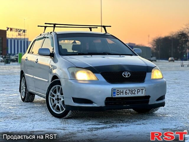 Сірий Тойота Королла, об'ємом двигуна 2 л та пробігом 290 тис. км за 3299 $, фото 1 на Automoto.ua