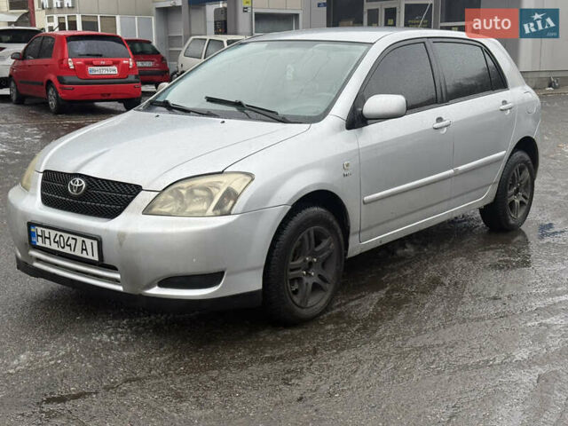 Серый Тойота Королла, объемом двигателя 1.4 л и пробегом 302 тыс. км за 3999 $, фото 1 на Automoto.ua
