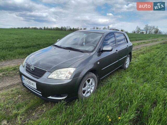 Сірий Тойота Королла, об'ємом двигуна 2 л та пробігом 166 тис. км за 4700 $, фото 1 на Automoto.ua