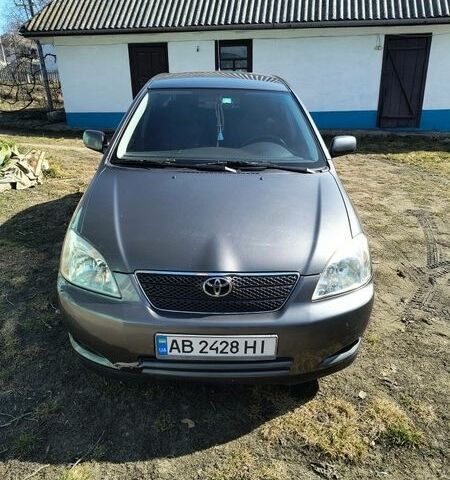 Сірий Тойота Королла, об'ємом двигуна 2 л та пробігом 166 тис. км за 5500 $, фото 1 на Automoto.ua