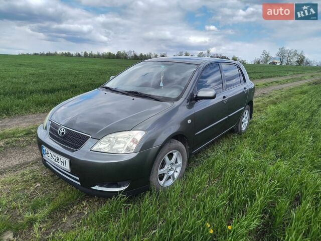 Сірий Тойота Королла, об'ємом двигуна 2 л та пробігом 166 тис. км за 4700 $, фото 1 на Automoto.ua