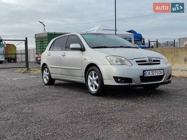 Серый Тойота Королла, объемом двигателя 1.4 л и пробегом 300 тыс. км за 5000 $, фото 1 на Automoto.ua