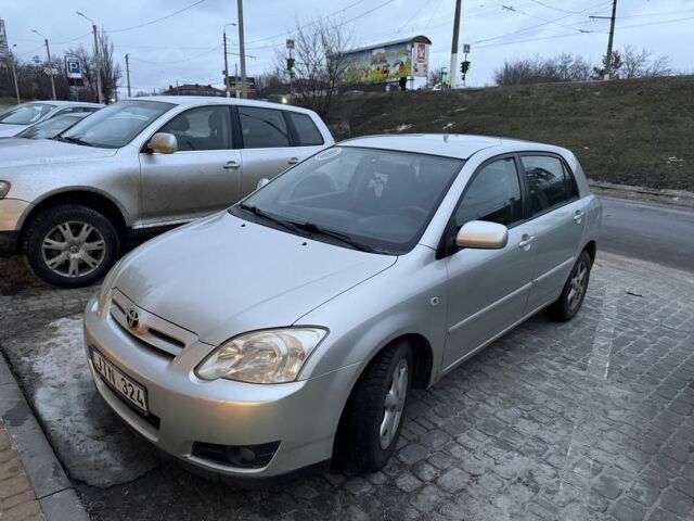 Серый Тойота Королла, объемом двигателя 1.4 л и пробегом 258 тыс. км за 1400 $, фото 1 на Automoto.ua