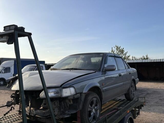 Серый Тойота Королла, объемом двигателя 1.6 л и пробегом 235 тыс. км за 650 $, фото 1 на Automoto.ua