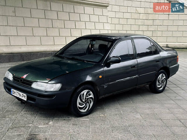 Серый Тойота Королла, объемом двигателя 1.33 л и пробегом 300 тыс. км за 950 $, фото 1 на Automoto.ua