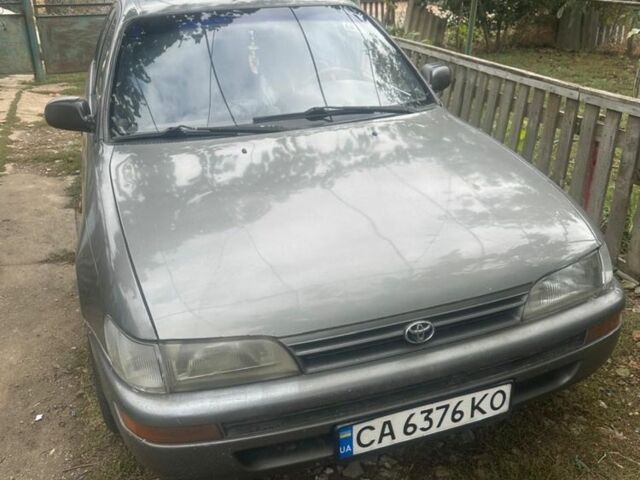 Сірий Тойота Королла, об'ємом двигуна 1.3 л та пробігом 239 тис. км за 1000 $, фото 1 на Automoto.ua