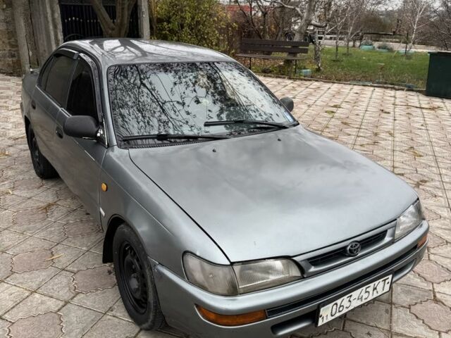 Серый Тойота Королла, объемом двигателя 1.4 л и пробегом 258 тыс. км за 1300 $, фото 1 на Automoto.ua