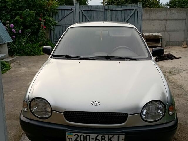 Серый Тойота Королла, объемом двигателя 1.4 л и пробегом 200 тыс. км за 1950 $, фото 1 на Automoto.ua