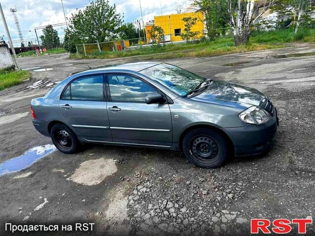 Сірий Тойота Королла, об'ємом двигуна 1.4 л та пробігом 256 тис. км за 3700 $, фото 1 на Automoto.ua