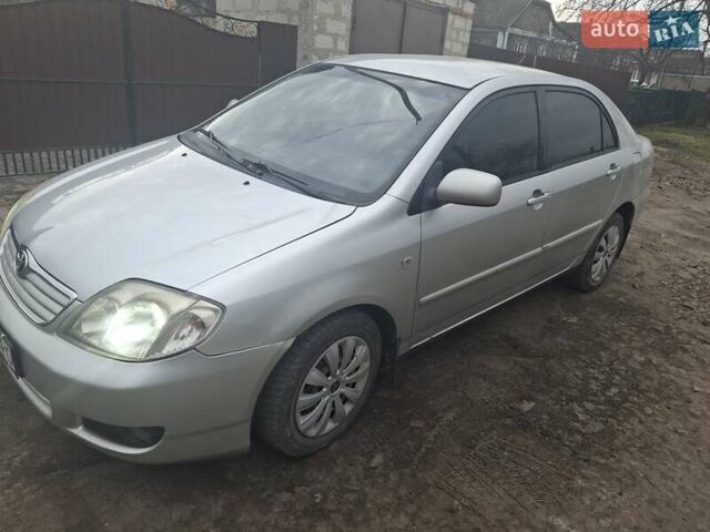 Серый Тойота Королла, объемом двигателя 1.6 л и пробегом 250 тыс. км за 5800 $, фото 1 на Automoto.ua