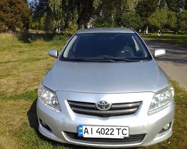 Сірий Тойота Королла, об'ємом двигуна 1.6 л та пробігом 292 тис. км за 5100 $, фото 1 на Automoto.ua