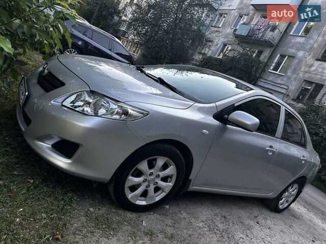 Серый Тойота Королла, объемом двигателя 1.6 л и пробегом 300 тыс. км за 8400 $, фото 1 на Automoto.ua