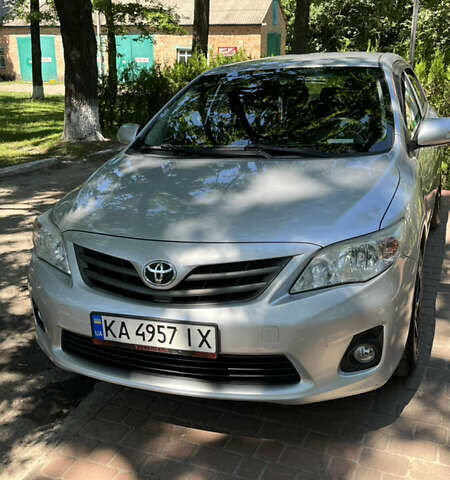 Сірий Тойота Королла, об'ємом двигуна 1.33 л та пробігом 203 тис. км за 6600 $, фото 1 на Automoto.ua