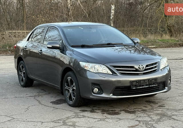 Сірий Тойота Королла, об'ємом двигуна 1.6 л та пробігом 83 тис. км за 10700 $, фото 1 на Automoto.ua