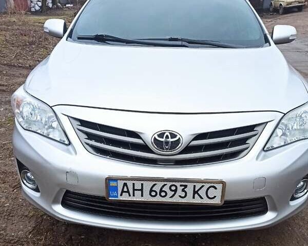 Сірий Тойота Королла, об'ємом двигуна 1.33 л та пробігом 176 тис. км за 8200 $, фото 1 на Automoto.ua