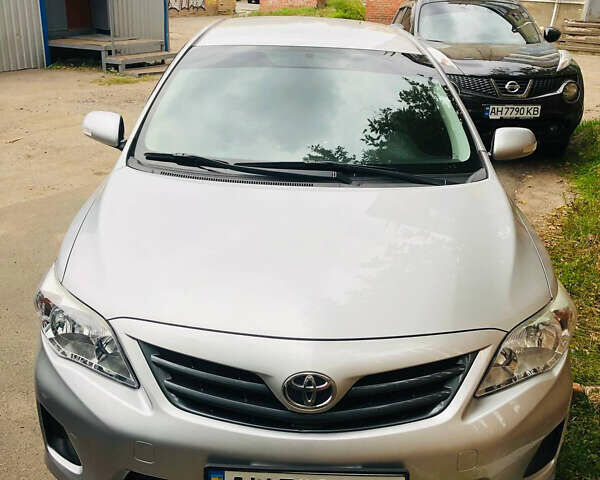 Сірий Тойота Королла, об'ємом двигуна 1.33 л та пробігом 160 тис. км за 7000 $, фото 1 на Automoto.ua