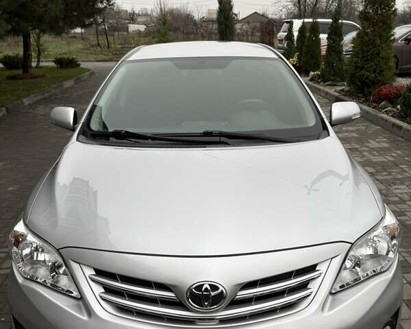 Сірий Тойота Королла, об'ємом двигуна 1.6 л та пробігом 85 тис. км за 12450 $, фото 1 на Automoto.ua