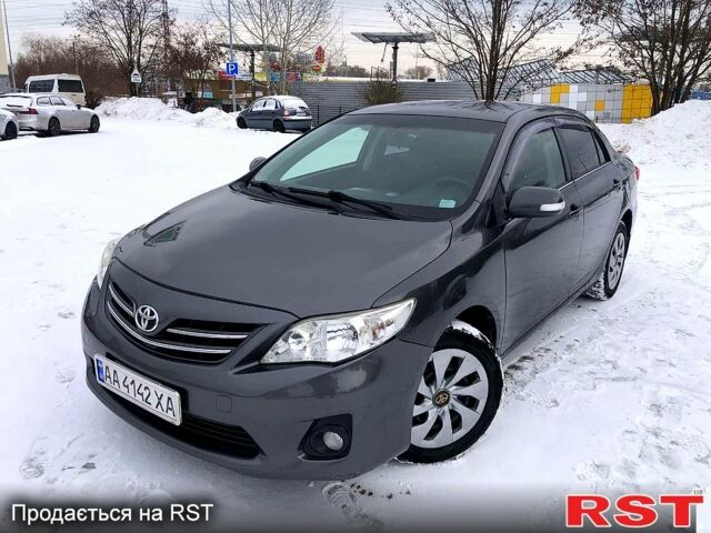 Серый Тойота Королла, объемом двигателя 1.6 л и пробегом 265 тыс. км за 7900 $, фото 1 на Automoto.ua