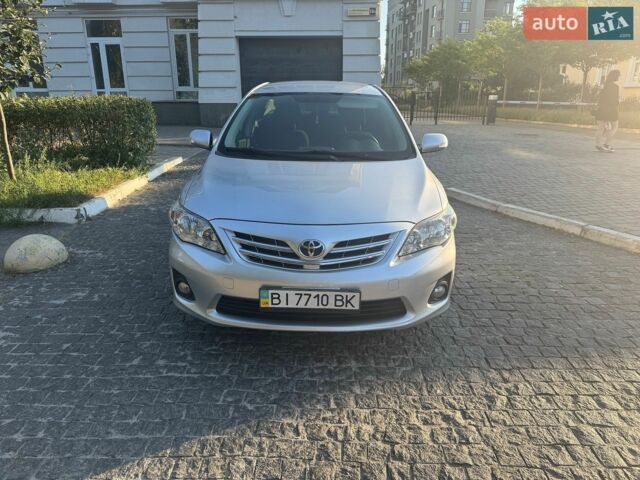 Сірий Тойота Королла, об'ємом двигуна 1.6 л та пробігом 117 тис. км за 10600 $, фото 1 на Automoto.ua