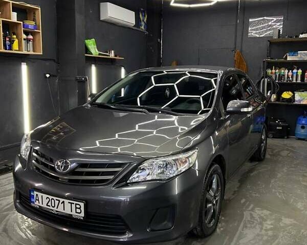 Серый Тойота Королла, объемом двигателя 1.6 л и пробегом 147 тыс. км за 7700 $, фото 1 на Automoto.ua