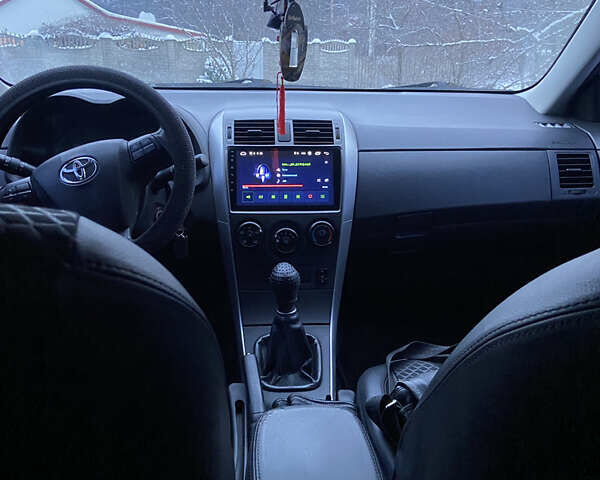 Серый Тойота Королла, объемом двигателя 1.33 л и пробегом 130 тыс. км за 9500 $, фото 1 на Automoto.ua