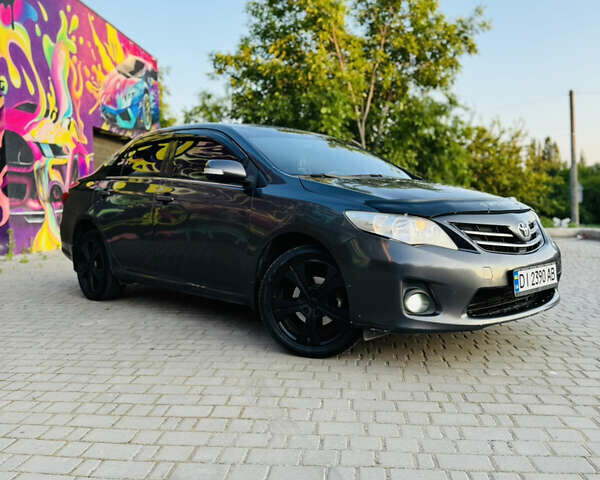 Сірий Тойота Королла, об'ємом двигуна 1.6 л та пробігом 280 тис. км за 6899 $, фото 1 на Automoto.ua