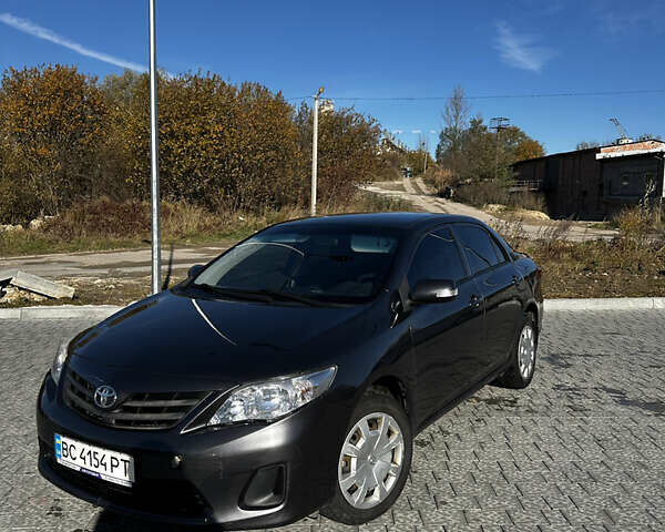 Серый Тойота Королла, объемом двигателя 1.6 л и пробегом 173 тыс. км за 8500 $, фото 1 на Automoto.ua