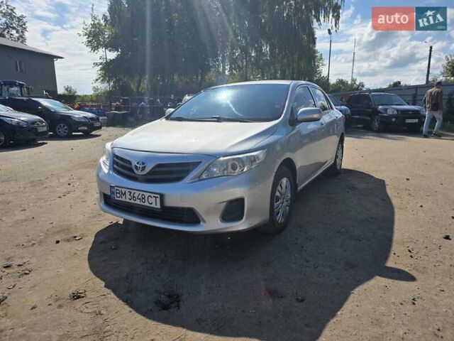 Сірий Тойота Королла, об'ємом двигуна 1.33 л та пробігом 252 тис. км за 6999 $, фото 1 на Automoto.ua