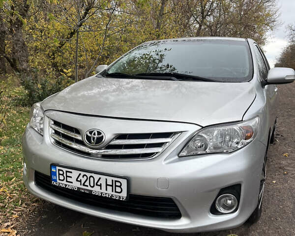 Сірий Тойота Королла, об'ємом двигуна 1.59 л та пробігом 217 тис. км за 8500 $, фото 1 на Automoto.ua