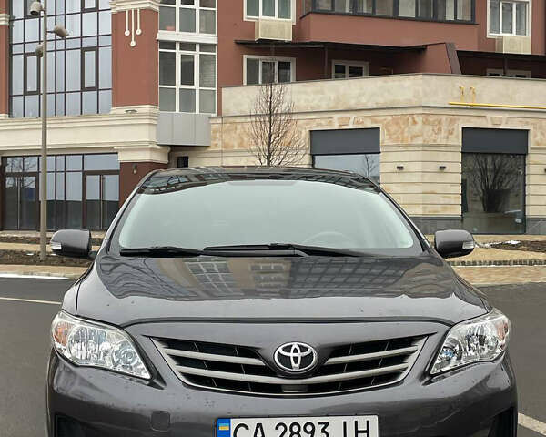 Сірий Тойота Королла, об'ємом двигуна 1.33 л та пробігом 165 тис. км за 9500 $, фото 1 на Automoto.ua