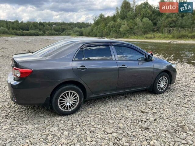 Сірий Тойота Королла, об'ємом двигуна 1.33 л та пробігом 165 тис. км за 7800 $, фото 1 на Automoto.ua